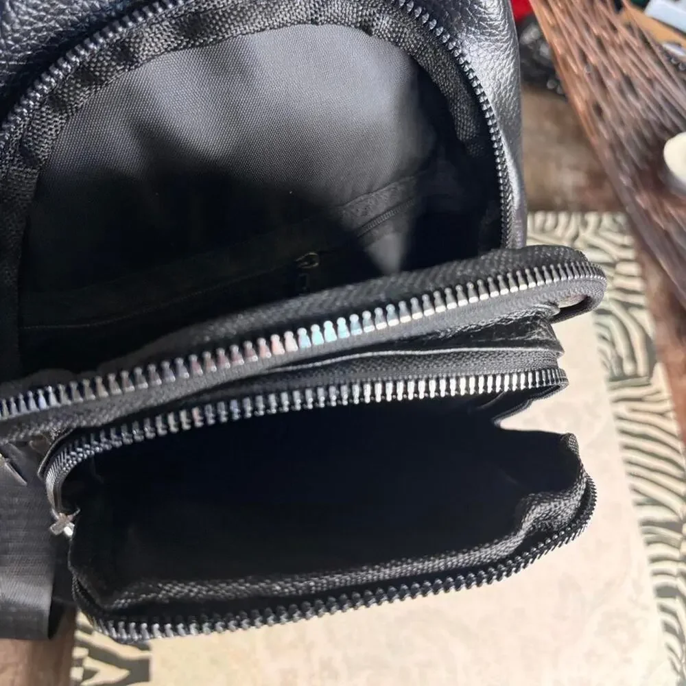 Black faux leather crossbody bag